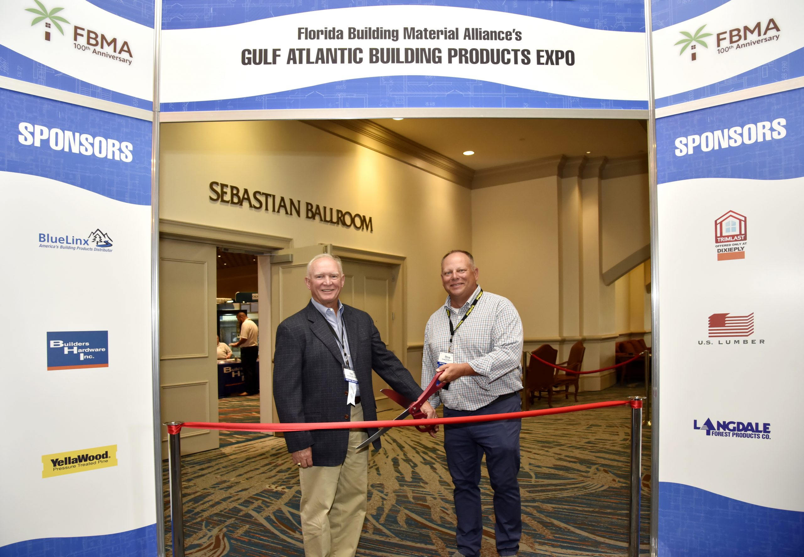 FBMA members cutting a ceremonial ribbon at the Gulf Atlantic Building Products Expo.
